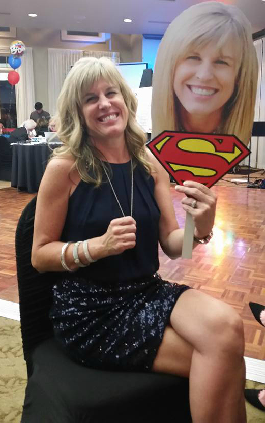 Bev with superman sign cutout